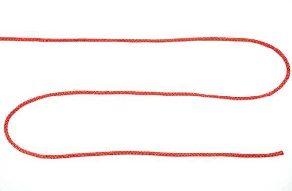 Rött Rep Vridet Form Ett Sicksack Vit Isolerad Bakgrund Röd — Stockfoto