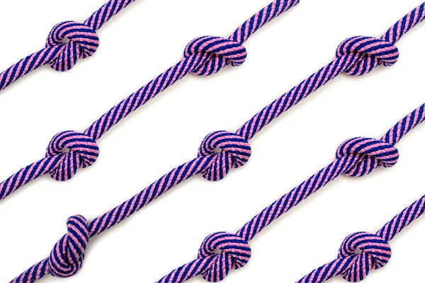 Фон Мотузок Вузлами Білому Тлі Мотузки Розташовані Діагоналі Вузлами Різнокольорові — стокове фото