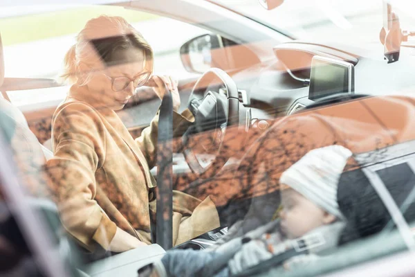 Mother Fastening Seat Belt Driving Family Car Running Errands While — Stock Photo, Image