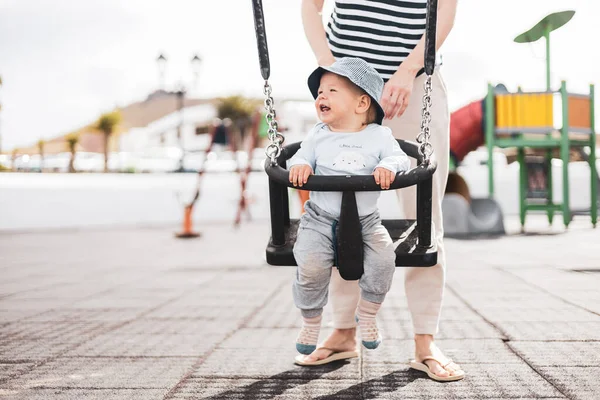 Mother Pushing Her Infant Baby Boy Child Swing Playground Outdoors — Stock Photo, Image