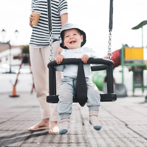 Mother Pushing Her Infant Baby Boy Child Swing Playground Outdoors — Stock Photo, Image