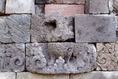 relief or carving on the stone wall at Penataran temple clipart