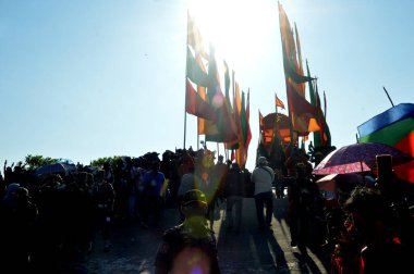 Tarakan - Indonesia, 8 October 2023 : The procession of lowering the boat to the sea during the Iraw Tengkayu XI festival series in the Ratu Intan area of Tarakan Amal Beach clipart