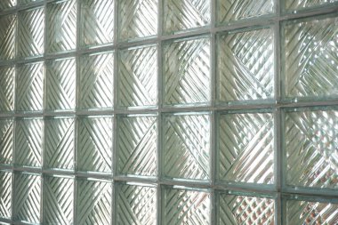 Cam tuğla duvar desenli, modern mimari bir detay sunuyor. Arkaplan, tasarım projeleri ve çağdaş tarz eklemek için mükemmel..                     