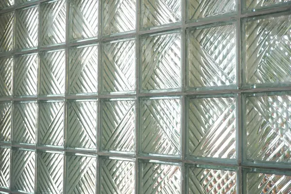 Cam tuğla duvar desenli, modern mimari bir detay sunuyor. Arkaplan, tasarım projeleri ve çağdaş tarz eklemek için mükemmel..                     