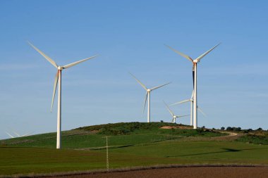 windmill on the green field in Spain                                                              