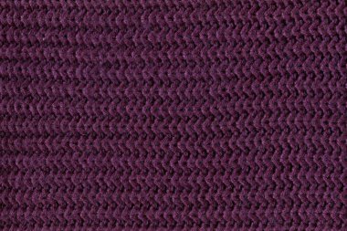 Yünden desenli kumaş. El yapımı kumaş mor yün arkaplan dokusu