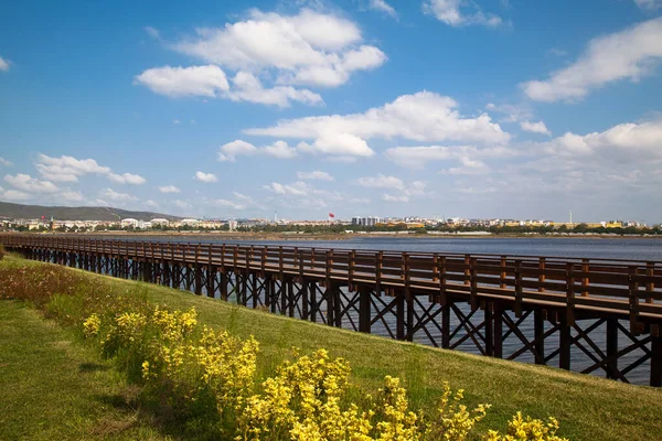 stock image Istanbul Turkey Tuzla Kamil Abdus Lake and its surrounding residential area, green areas and wooden pier around the lake, August 30 2022