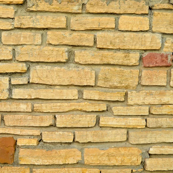 Parede Pedra Cortada Amarelo Bege Resistente Boa Para Fundos Sem — Fotografia de Stock