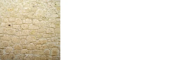 頑丈な白とベージュのカット石の壁 背景のために良い シームレスに並んで バナーモックアップポスターデザイン — ストック写真