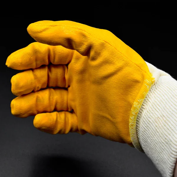 Luvas Trabalho Protetoras Novas Amarelas Isoladas Fundo Preto — Fotografia de Stock