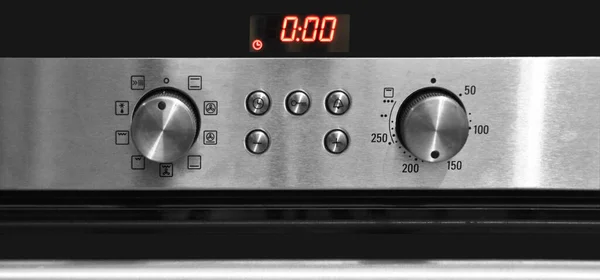 现代厨房有一个烤箱和控制面板 烤箱控制面板 — 图库照片