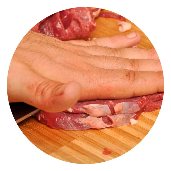 Clean very fresh red raw cow meat sharp knife and hand, on cutting board