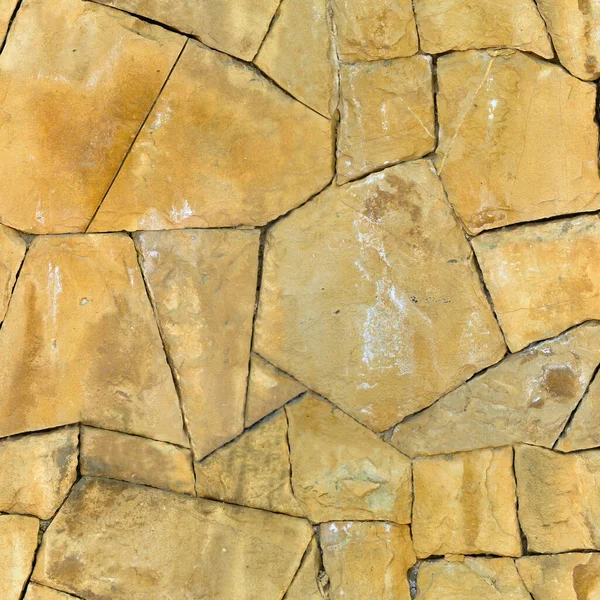 Robuste Gelb Und Beige Geschliffene Steinmauer Gut Für Hintergründe Nahtlos — Stockfoto