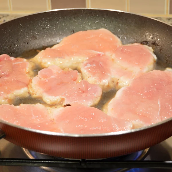 stock image Fresh chicken steak frying in pan on stove, homemade very healthy food