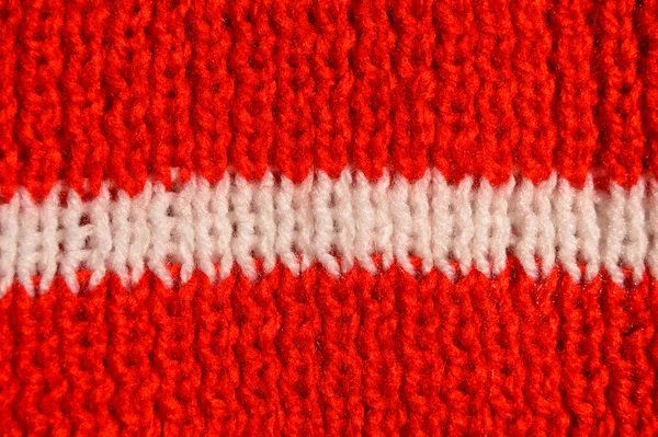 用羊毛制成的花纹织物 手工针织物红 白羊毛背景质感 — 图库照片