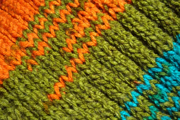用羊毛制成的花纹织物 手工针织物绿松石橙色和绿色羊毛背景纹理 — 图库照片