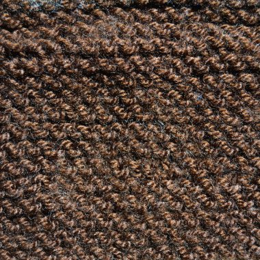 Yünden desenli kumaş. El yapımı kumaş kahverengi yün arkaplan dokusu