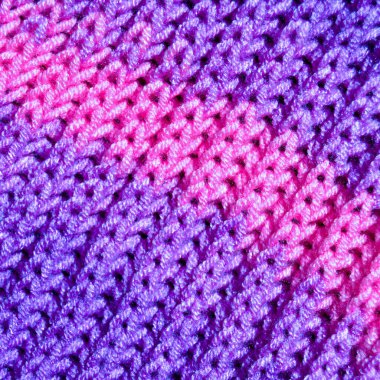 Yünden desenli kumaş. El yapımı kumaş mor yün arkaplan dokusu