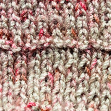 Yünden desenli kumaş. El yapımı örgü kumaş gri yün arkaplan dokusu