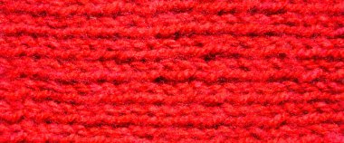 Yünden desenli kumaş. El yapımı kumaş, kırmızı yün arkaplan dokusu