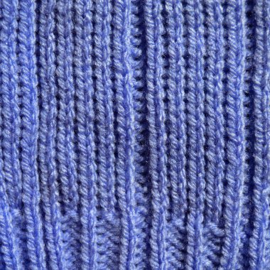 Yünden desenli kumaş. El yapımı kumaş mavi yün arkaplan dokusu