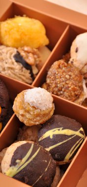 Fresh delicious and baked assorted cookies in gift carton box