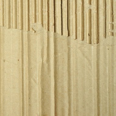 Kahverengi ve bej işlemeli karton, arka plan için çok uygun.