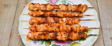 A magnificent dining table and chicken shish kebab in a luxury restaurant, delicious tavuk sis kebab