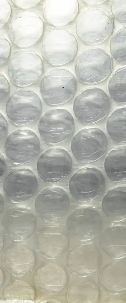 Plastic air bubble protection foil wrap texture background, air bubble packing texture