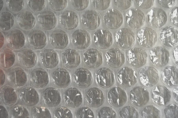 Plastic air bubble protection foil wrap texture background, air bubble packing texture