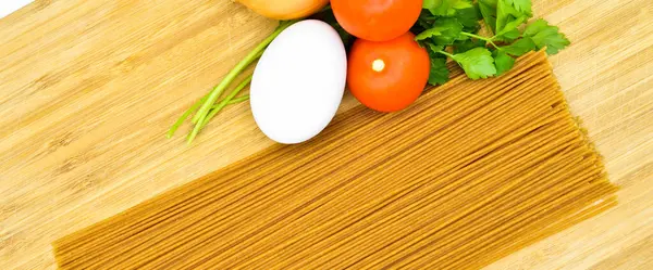 Raw Healthy Macaroni Dry Pasta Stick Organic Tomato Parsley Egg Stock Photo