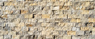 Dikdörtgen kesim bej mermer duvar dokusu arka plan olabilir, fayanssız dizilmiş