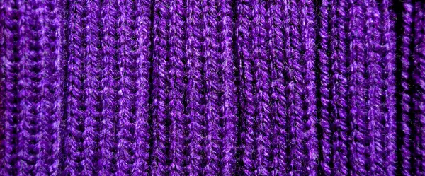 Yünden desenli kumaş. El yapımı kumaş mor yün arkaplan dokusu