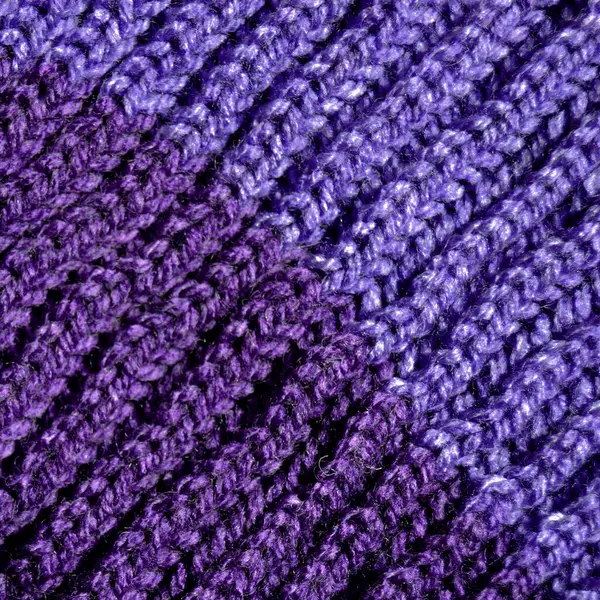 Yünden desenli kumaş. El yapımı kumaş mor yün arkaplan dokusu