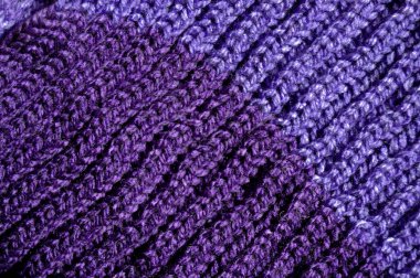 Yünden desenli kumaş. El yapımı kumaş mor yün arkaplan dokusu