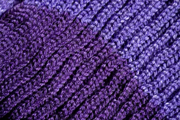 Yünden desenli kumaş. El yapımı kumaş mor yün arkaplan dokusu