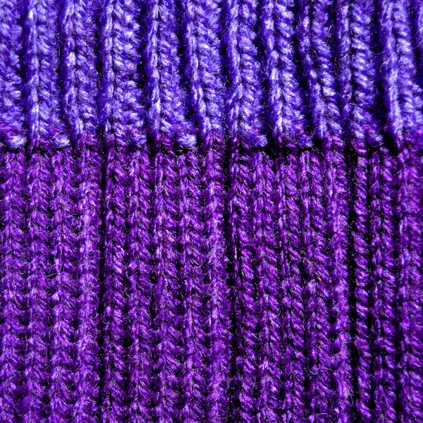 Yünden desenli kumaş. El yapımı kumaş mor yün arkaplan dokusu