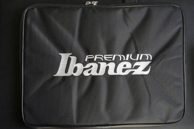 Details of the ibanez electric guitar case and bag made of sturdy black fabric, Istanbul Turkey April 10 2024 clipart