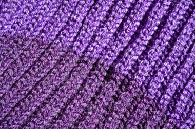 Yünden desenli kumaş. El yapımı kumaş mor ve mavi yün arkaplan dokusu