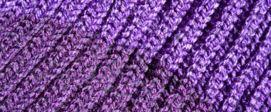 Yünden desenli kumaş. El yapımı kumaş mor ve mavi yün arkaplan dokusu