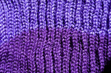 Yünden desenli kumaş. El yapımı kumaş mor ve mavi yün arkaplan dokusu