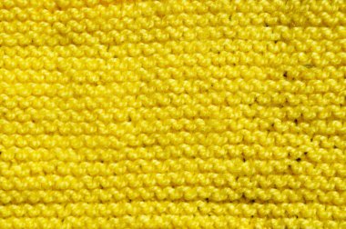 Yünden desenli kumaş. El yapımı örgü kumaş sarı yün arkaplan dokusu