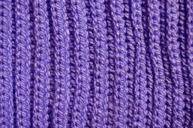 Yünden desenli kumaş. El yapımı kumaş mor ve mavi yün arkaplan dokusu