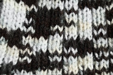 Yünden desenli kumaş. El yapımı kumaş ve siyah kahverengi yün arkaplan dokusu