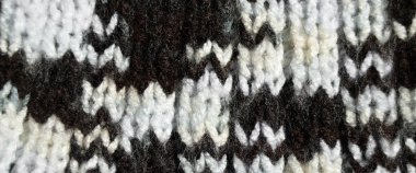 Yünden desenli kumaş. El yapımı kumaş ve siyah kahverengi yün arkaplan dokusu