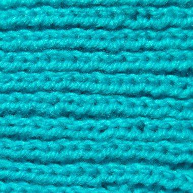 Yünden desenli kumaş. El yapımı kumaş mavi yün arkaplan dokusu