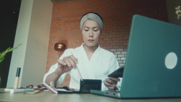 Young Asian Transgender Queer Man Learns How Makeup Online Laptop — Vídeos de Stock