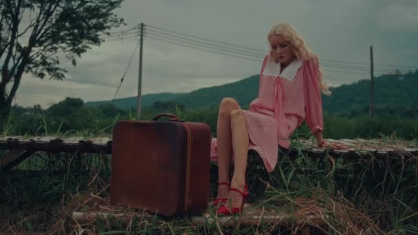 Woman Vintage Dress Kicks Retro Suitcase Sitting Bridge High Quality — Stock Video