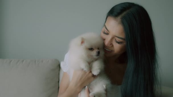 Young Thai Woman Portrait Holding Cute Little White Spitz Dog — Stock Video